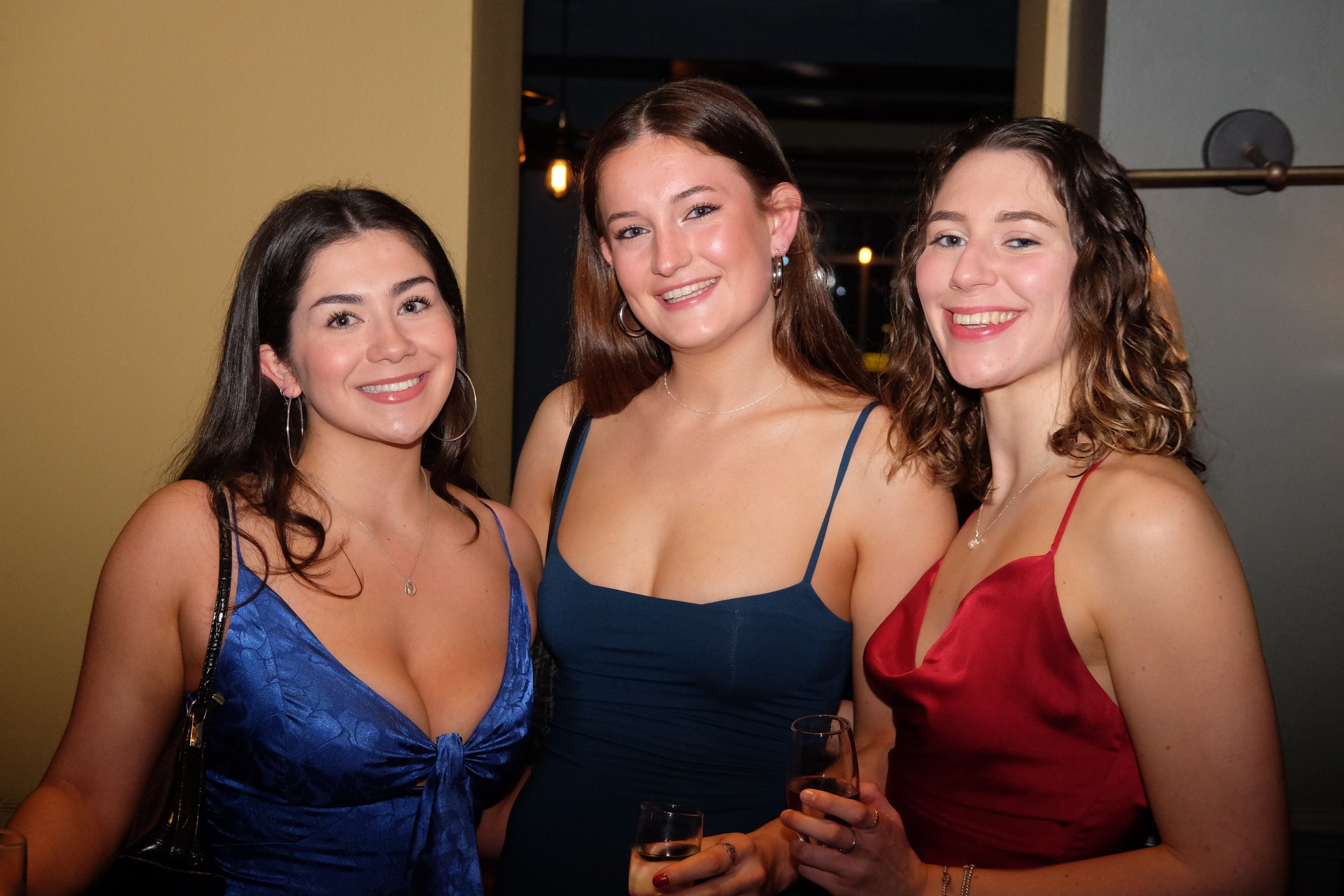 Eliza dressed up with two friends at rugby dinner.