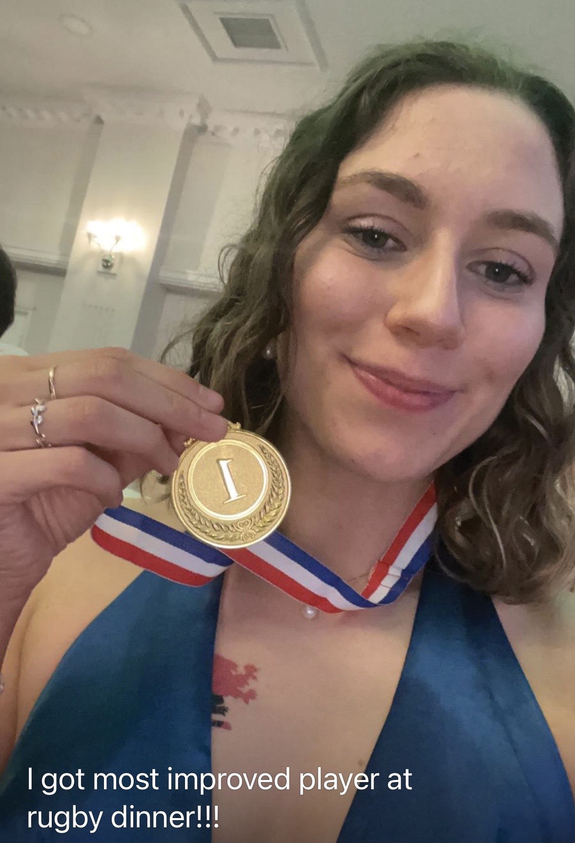 Eliza with her medal